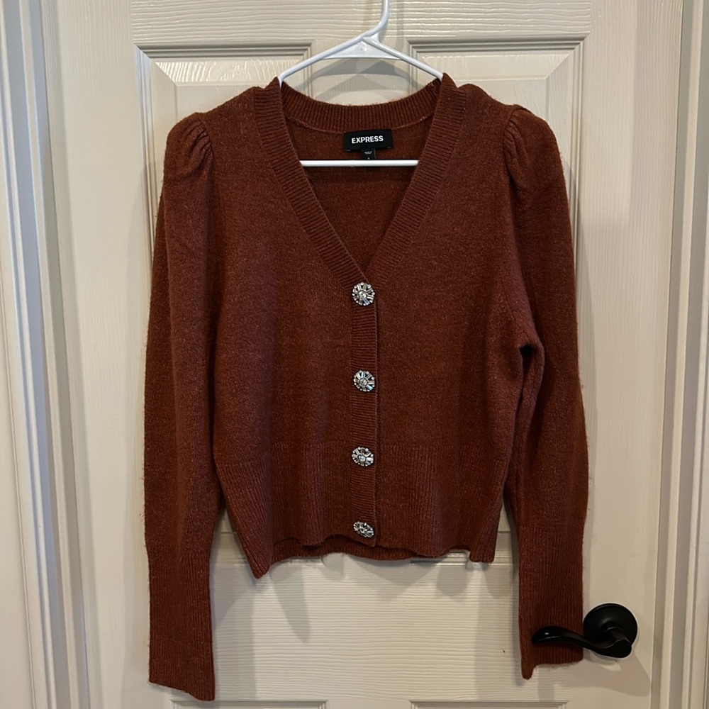 Burgundy express sweater; gently worn.